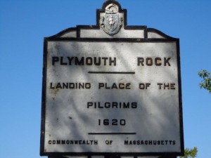 Sign located next to Plymouth Rock
