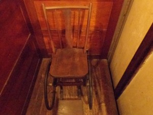 Wheel chair of FDR sitting inside his elevator at his home.