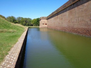 The moat completely surrounds the fort.